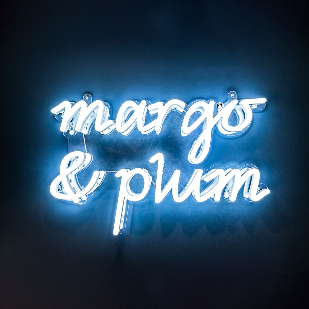Margo and Plum Neon White Blue Light banner square
